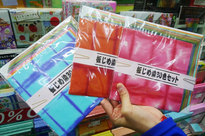 You can get little packs of origami and tie-dye papers at Sekaido too.